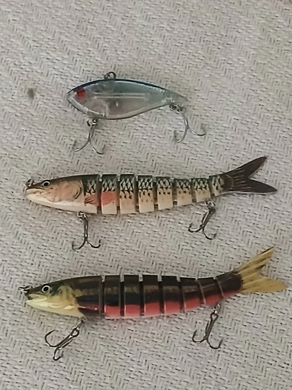 Multi-Section Fishing Lures Set in Blue, Tan, and Red